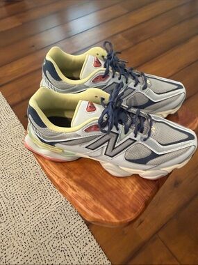 New Balance 1060 Gray & Navy Mesh Sneakers with Yellow Lining and Coral Accents